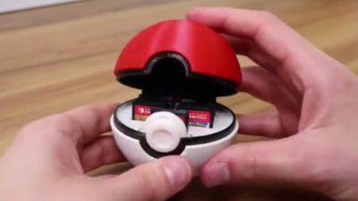 Echa un vistazo a este Poké Ball-tarjetero para cartuchos de Nintendo Switch creado con impresión 3D
